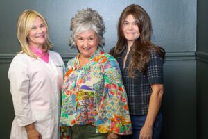 Dr Michelle Carr, Rebecca Comeaux, Johanna Divine, modelling some of Rebecca's wigs Out to Lunch at Gravy in Downtown Lafayette